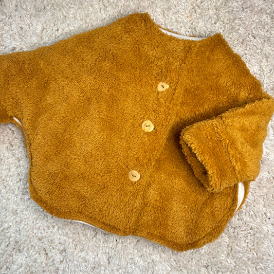 Veste en sherpa jaune moutarde